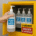 Hand placing alcohol hand sanitizer bottle into yellow fireproof Justrite cabinet for NFPA storage compliance.