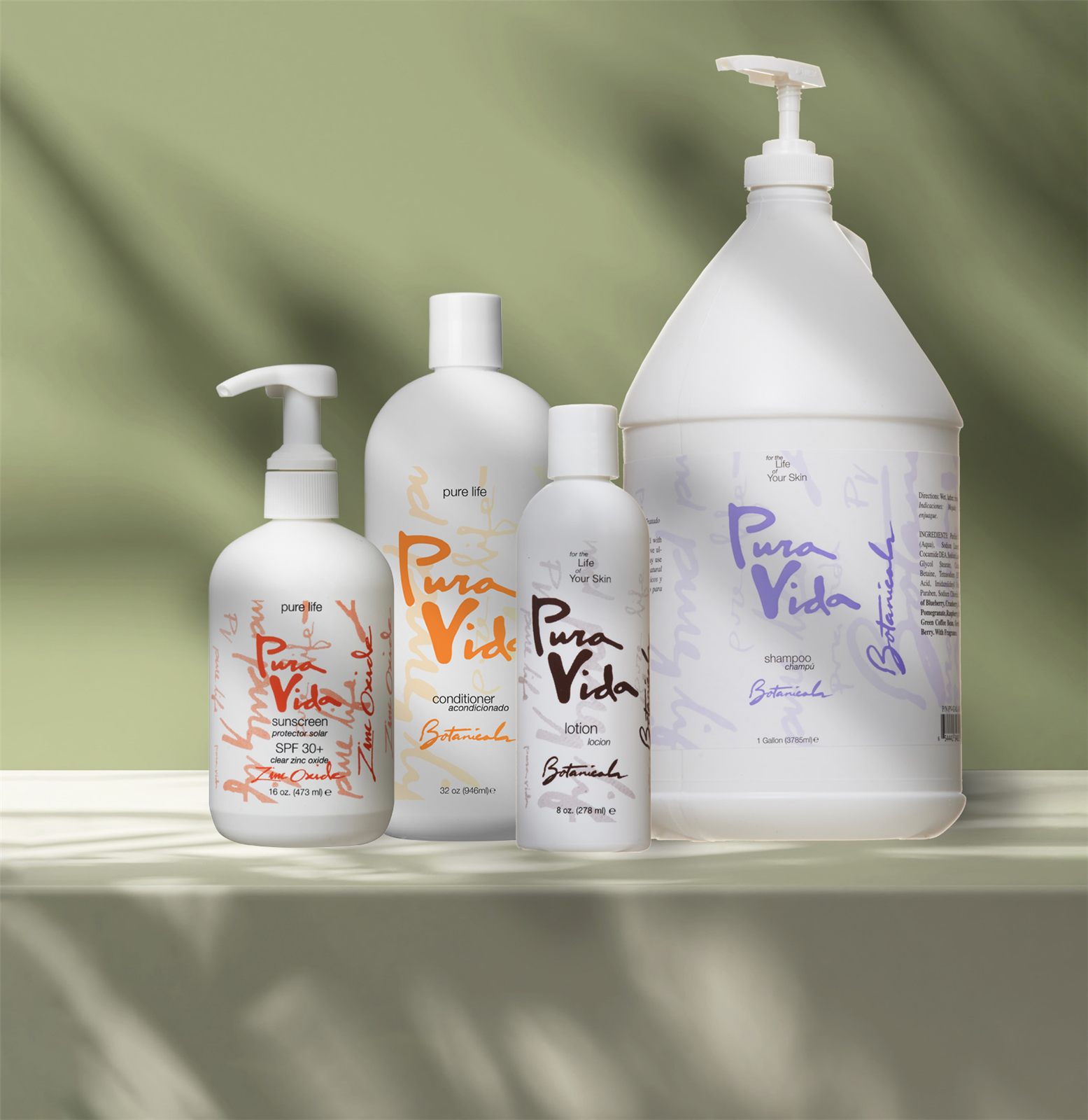 Pura Vida shampoo, conditioner and body wash bottles in pump and gallon sizes