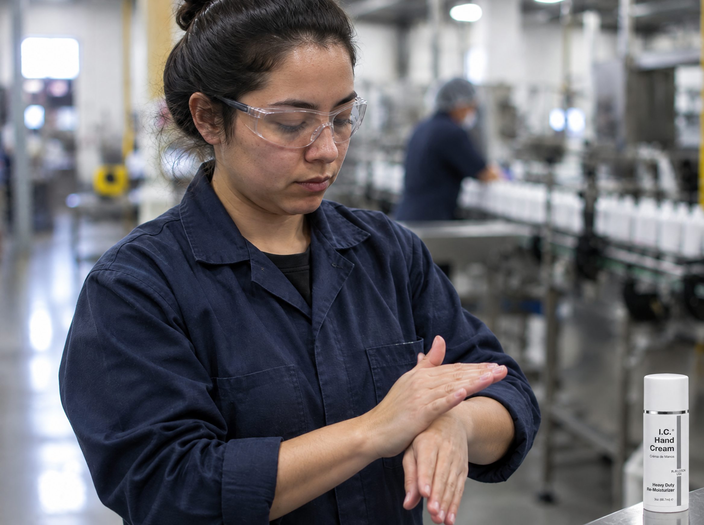General Manufacturing worker using R&R Lotion skin care (Gloving up)